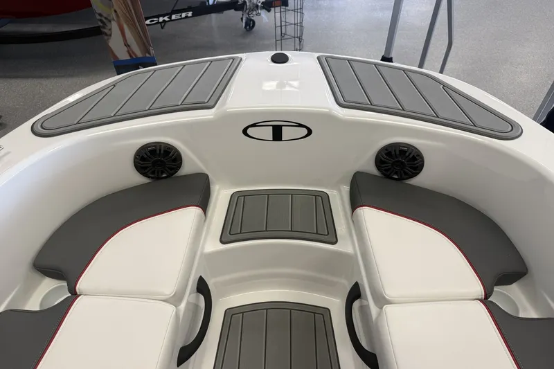 Slide: The Image of Interior view of 2027 Tahoe T18 boat with cushioned seating and speakers. - 7