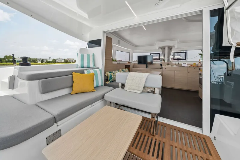 Slide: The Image of Modern interior of 2026 Lagoon 38 catamaran with cozy seating and stylish decor. - 55