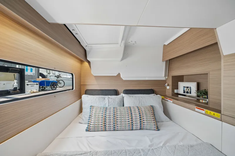 Slide: The Image of Luxurious interior cabin of 2026 Lagoon 38 yacht with modern design and cozy bedding. - 75
