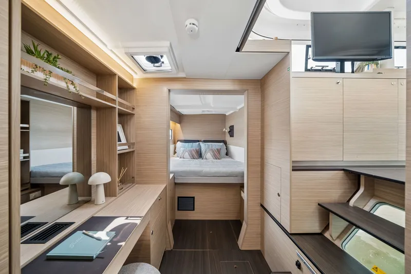 Slide: The Image of Luxurious interior of 2026 Lagoon 38 yacht featuring modern design and cozy bedroom. - 65