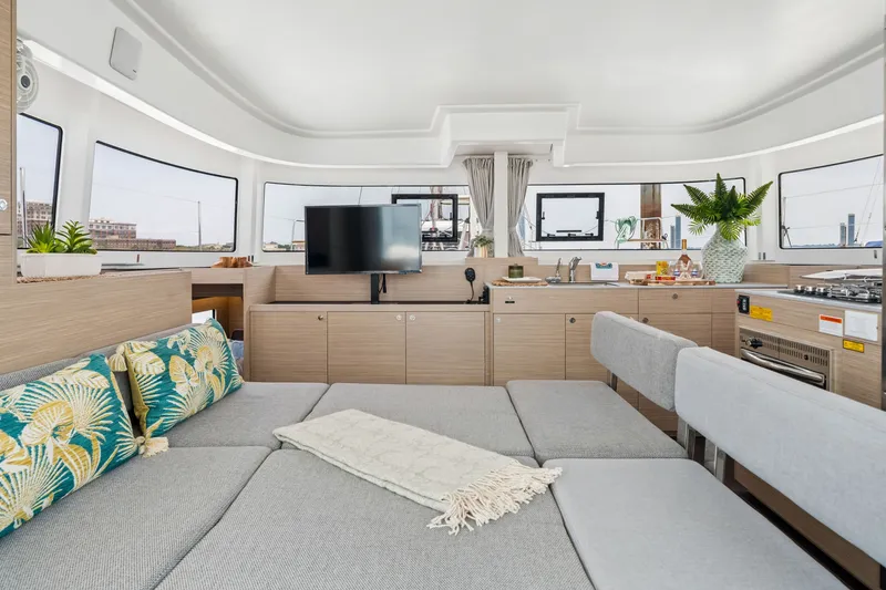 Slide: The Image of Modern interior of 2026 Lagoon 38 catamaran with cozy seating and stylish decor. - 53
