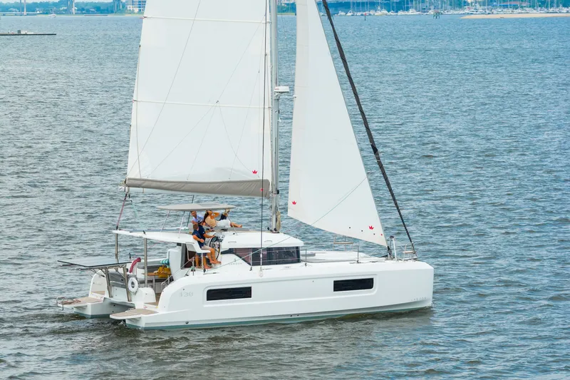 Slide: The Image of Sailing on a 2026 Lagoon 38 catamaran in open waters. - 124