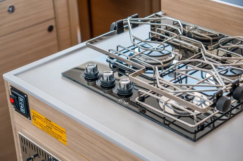 Slide: The Image of Modern stove in 2026 Lagoon 38 yacht kitchen, featuring sleek design and controls. - 49
