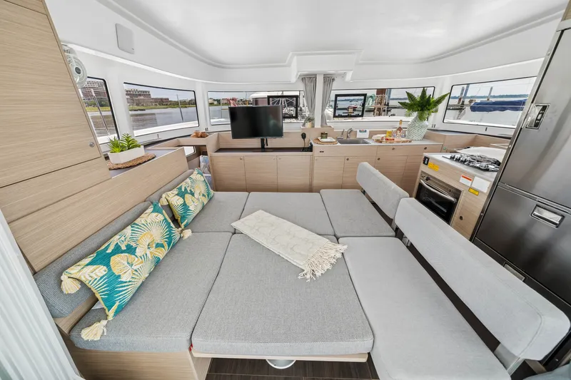 Slide: The Image of Modern interior of 2026 Lagoon 38 catamaran with cozy seating and stylish decor. - 52