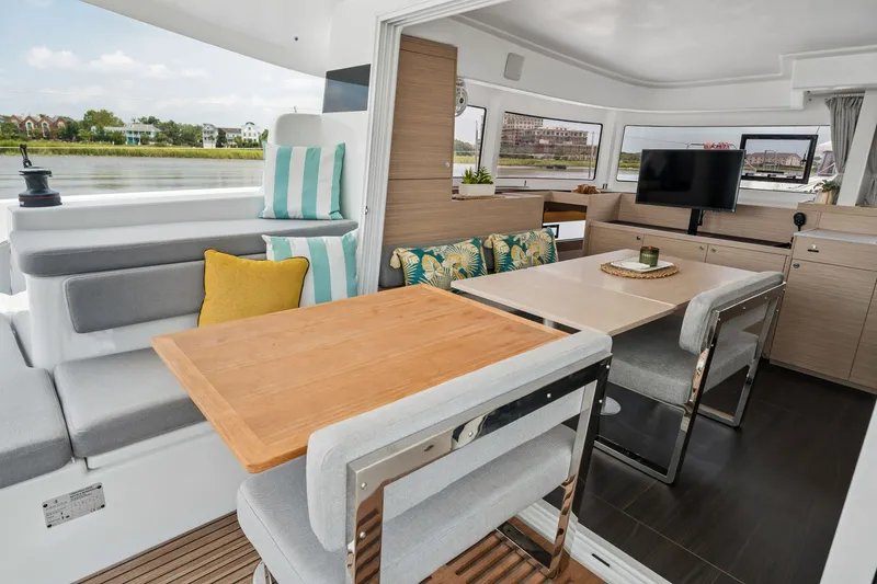 Slide: The Image of Modern interior of 2026 Lagoon 38 catamaran with stylish seating and dining area. - 46