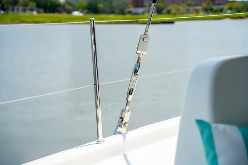 Slide: The Image of Close-up of 2026 Lagoon 38 yacht railing with water view. - 33