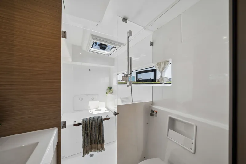 Slide: The Image of Modern bathroom interior of 2026 Lagoon 38 yacht, featuring sleek design and natural light. - 68