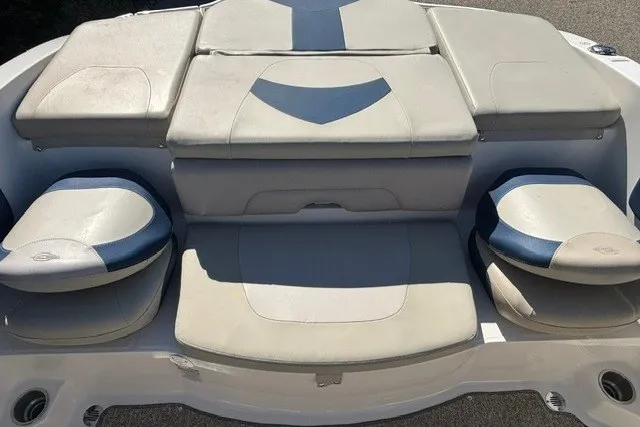 Slide: The Image of 2015 Chaparral 21 SSi Ski & Fish boat seating area with cushioned seats. - 20