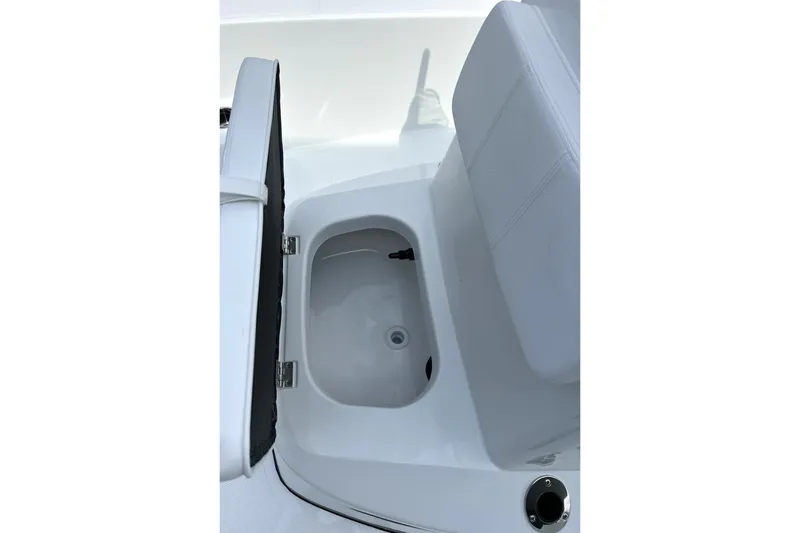 Slide: The Image of Open storage compartment on 2027 Frontier 180 boat, showcasing interior design and functionality. - 4