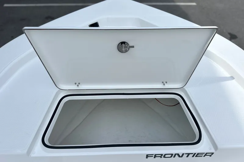 Slide: The Image of Open storage compartment on a 2027 Frontier 180 boat, showcasing spacious interior. - 5