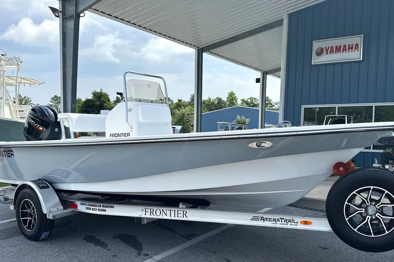 The Image of 2027 Frontier 180 boat on trailer at Yamaha dealership. - 0
