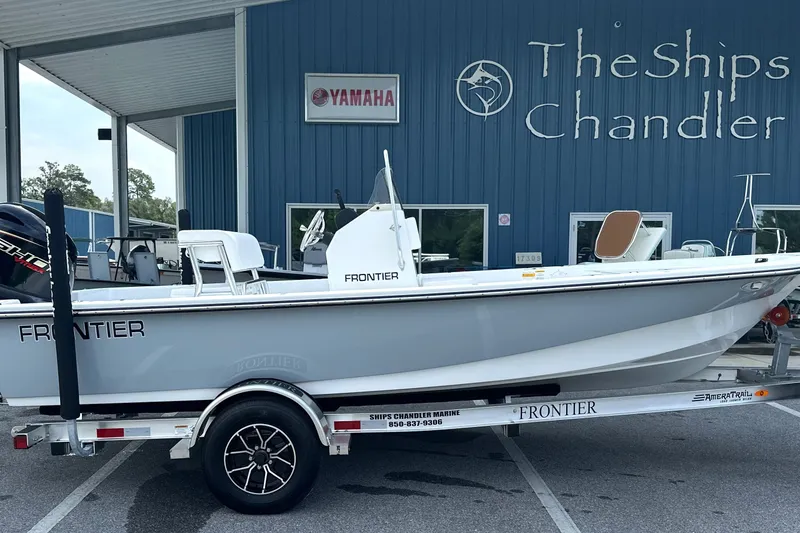 Slide: The Image of 2027 Frontier 180 boat on trailer at The Ships Chandler dealership. - 17