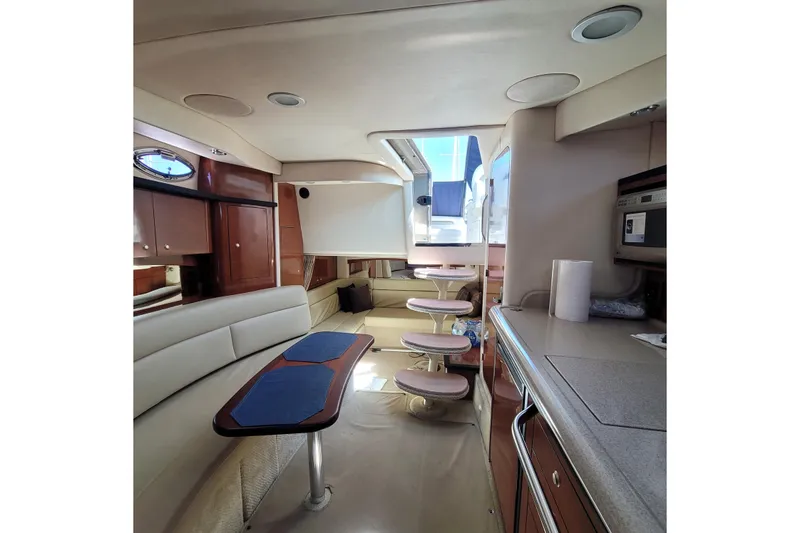 Slide: The Image of Luxurious interior of a 2007 Sea Ray 340 yacht with modern amenities. - 24