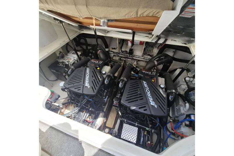 Slide: The Image of Engine compartment of a 2007 Sea Ray 340 with twin Mercury engines. - 21