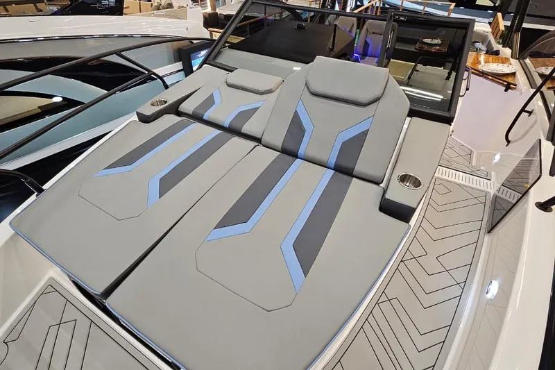 Slide: The Image of 2026 Hanover 327 boat with sleek, modern seating and stylish design elements. - 10
