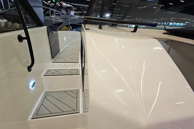 Slide: The Image of 2026 Hanover 327 boat interior with sleek white design and modern features. - 9