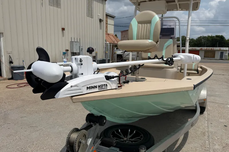 Slide: The Image of 2021 G3 Bay 20 DLX boat with Minn Kota Terrova motor, parked outdoors. - 7