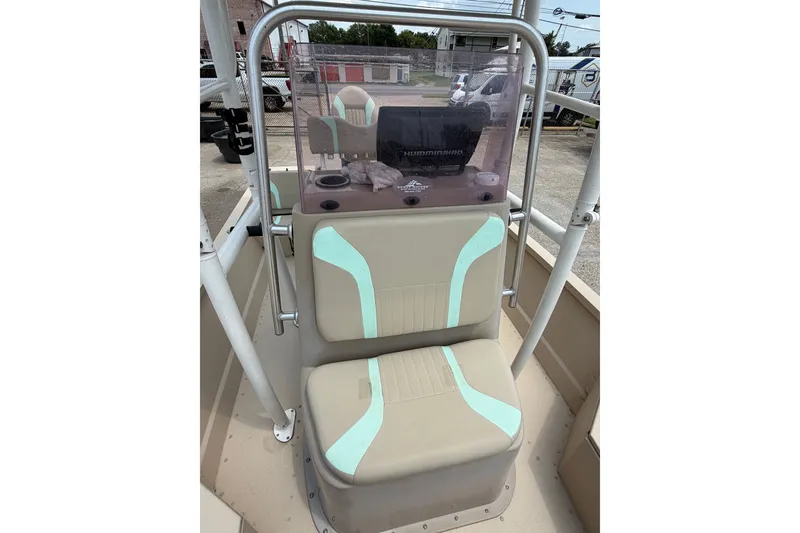 Slide: The Image of 2021 G3 Bay 20 DLX boat console with seating and navigation equipment. - 10