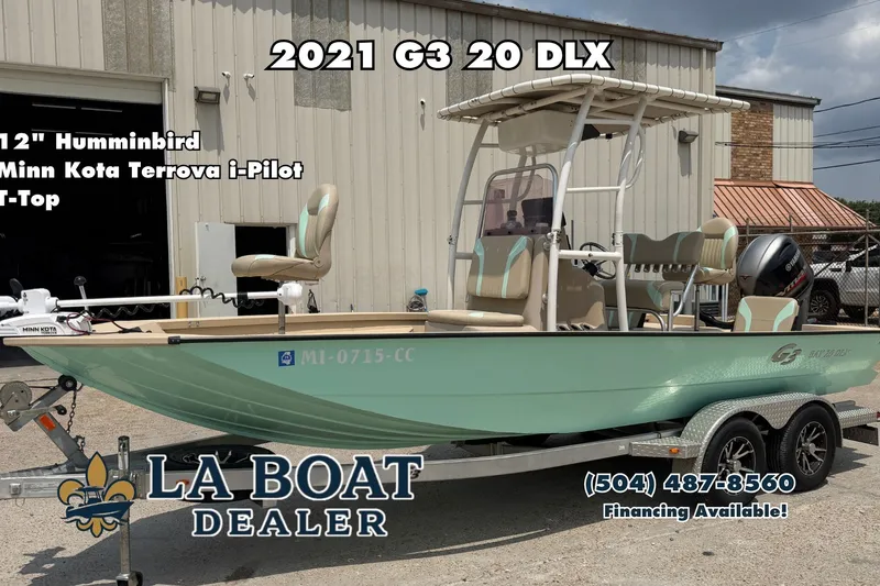 The Image of 2021 G3 Bay 20 DLX boat with T-Top, trailer, and Minn Kota Terrova i-Pilot. - 0