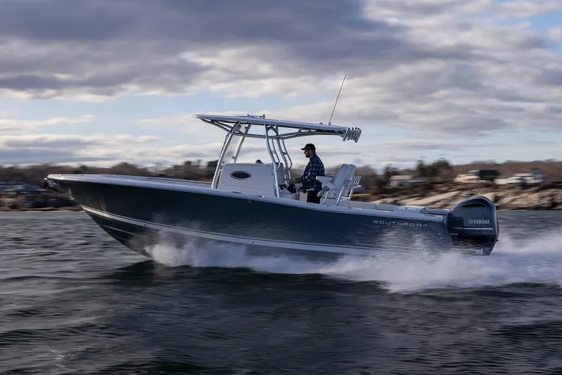 Slide: The Image of Manufacturer Provided Image: 2025 Southport 27 FE boat cruising on water under cloudy sky. - 3