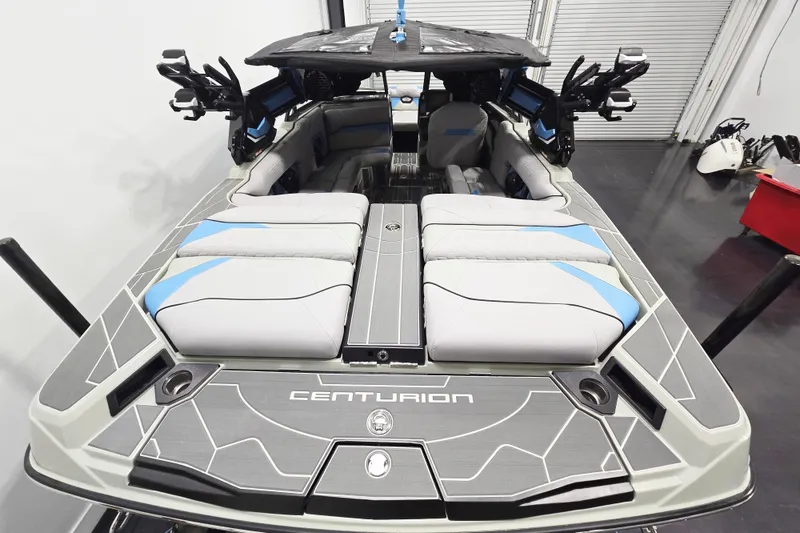 Slide: The Image of 2026 Centurion Ri230 boat interior with sleek seating and modern design. - 7