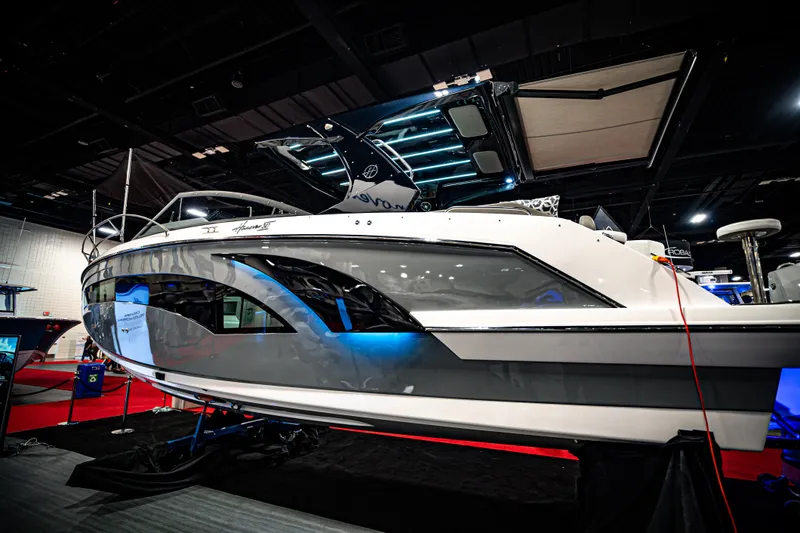 Slide: The Image of 2026 Hanover 347 boat displayed indoors with sleek design and modern features. - 0