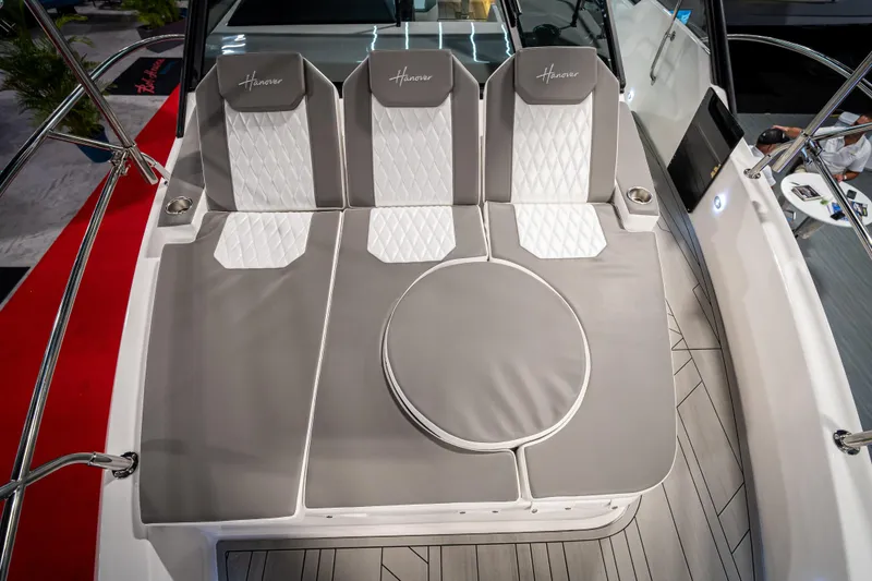 Slide: The Image of 2026 Hanover 347 boat interior with luxurious gray and white seating. - 10
