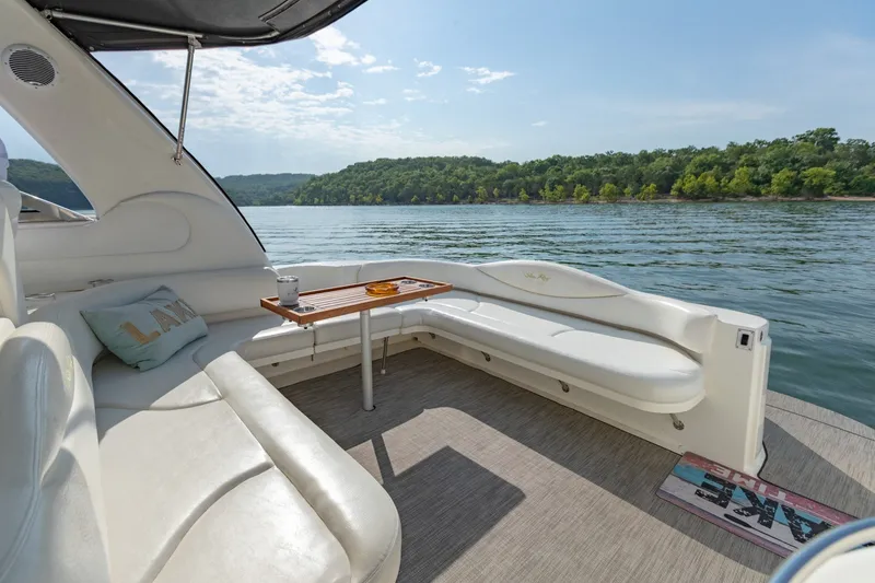 Slide: The Image of Luxurious 2000 Sea Ray 410 Sundancer yacht interior with scenic lake view. - 15