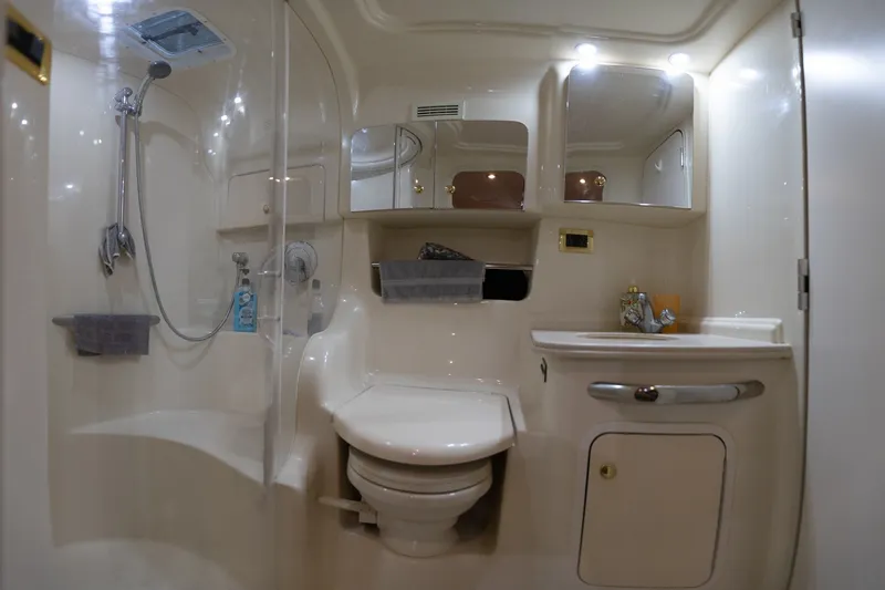 Slide: The Image of Luxurious bathroom in 2000 Sea Ray 410 Sundancer yacht with shower and vanity. - 56