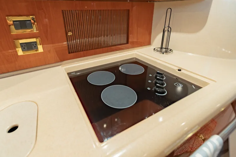 Slide: The Image of Luxury yacht kitchen with modern stovetop, Sea Ray 410 Sundancer, 2000 model. - 50