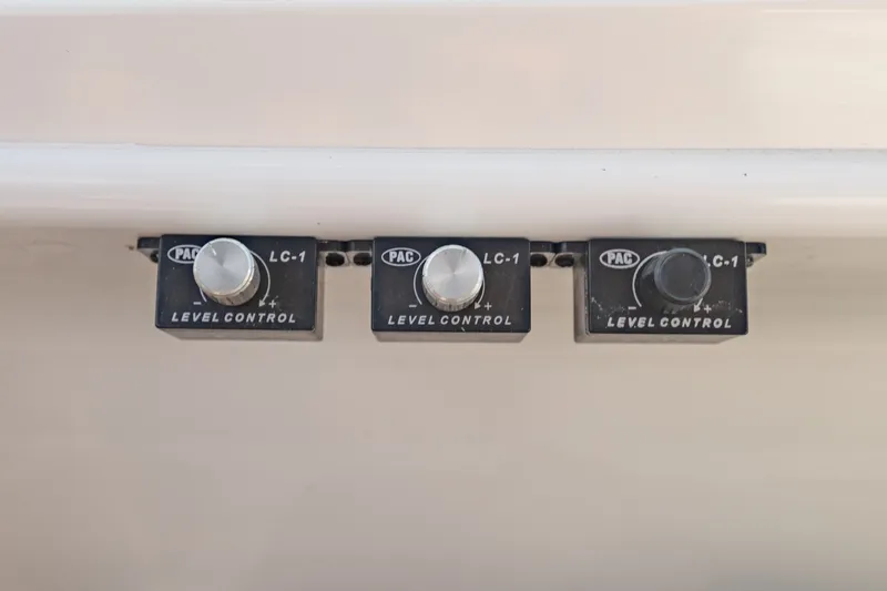 Slide: The Image of Close-up of PAC LC-1 level control knobs on a 2000 Sea Ray 410 Sundancer. - 36