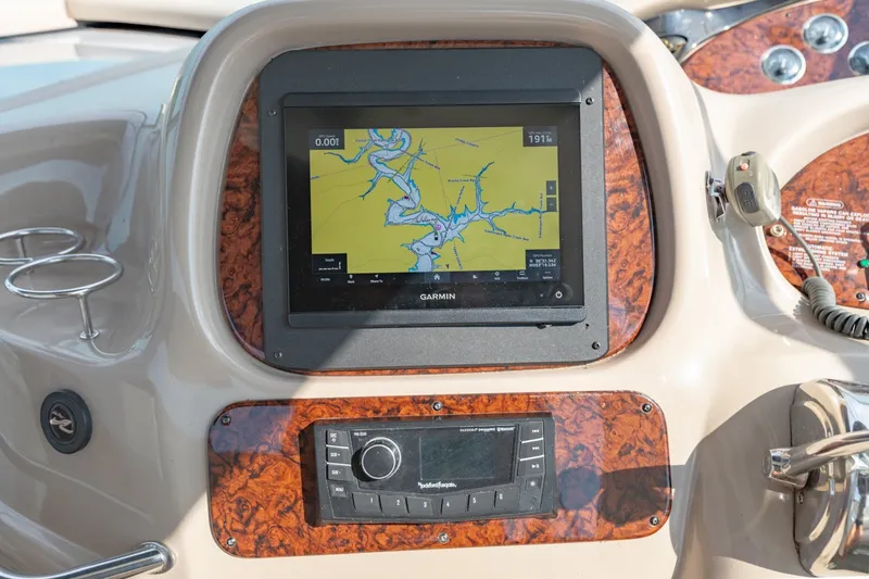 Slide: The Image of Garmin navigation system on 2000 Sea Ray 410 Sundancer yacht dashboard. - 35