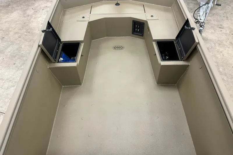 Slide: The Image of Interior of 2027 Thor 1754 Thunder Hammer boat with open storage compartments. - 15