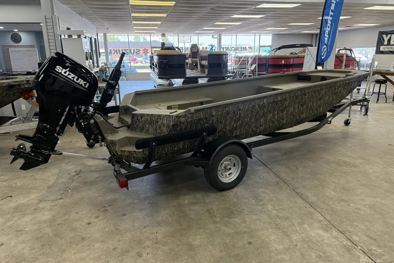 Slide: The Image of 2027 Thor 1754 Thunder Hammer boat with Suzuki motor on display in showroom. - 5