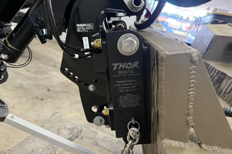 Slide: The Image of Close-up of a 2027 Thor 1754 Thunder Hammer boat component with branding and manufacturing details. - 8
