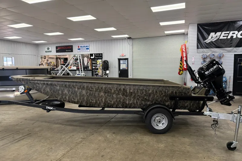 Slide: The Image of 2027 Thor 1754 Thunder Hammer boat with Suzuki motor in showroom. - 4