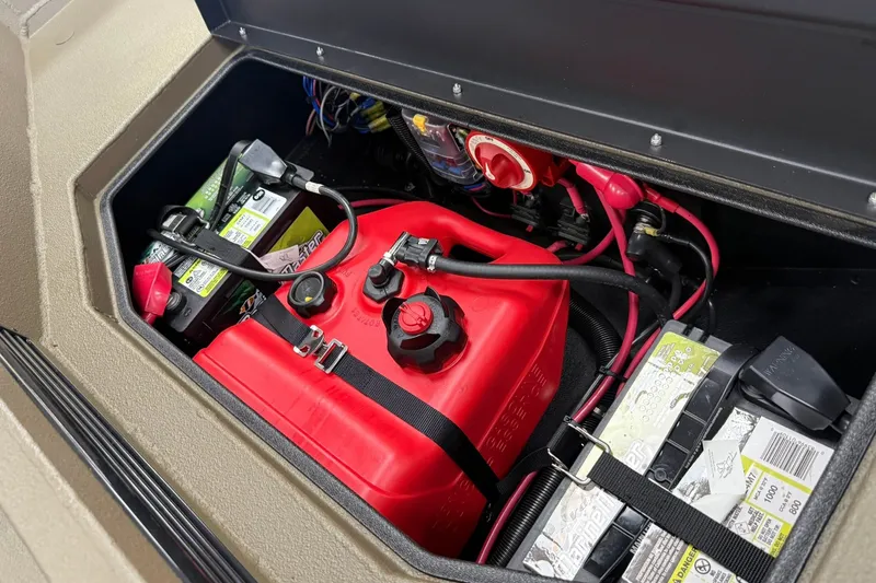 Slide: The Image of Battery and fuel tank setup in a 2027 Thor 1754 Thunder Hammer. - 7