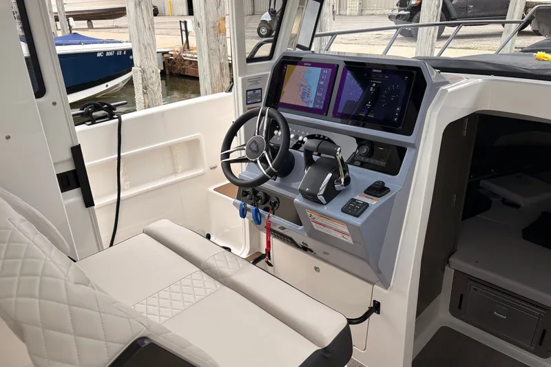 Slide: The Image of Interior cockpit of 2026 Navan C30 boat with modern navigation controls. - 17