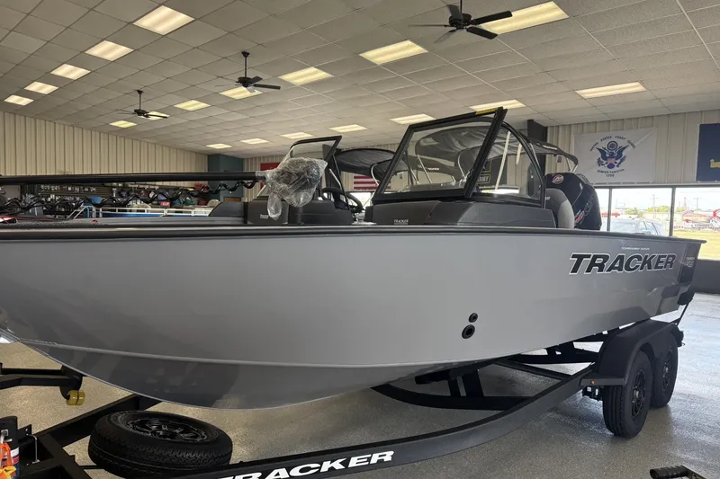 The Image of 2027 Tracker Targa V-19 Combo boat displayed in a showroom. - 0