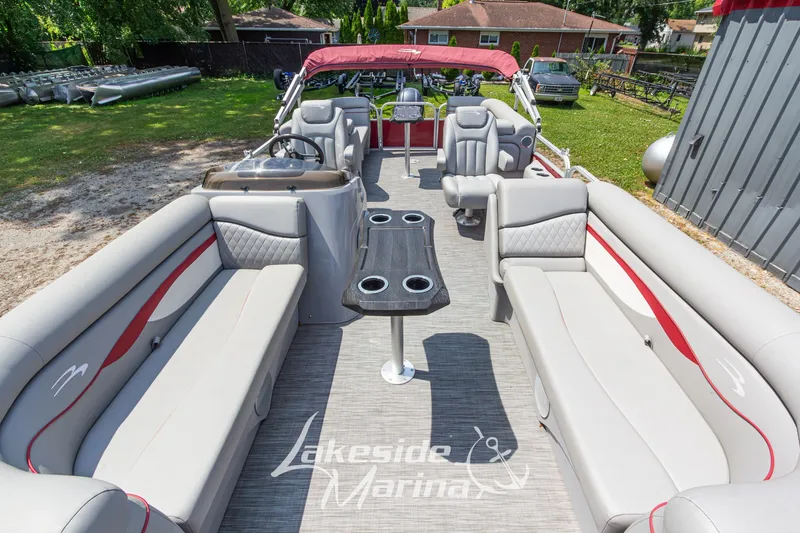 Slide: The Image of 2021 Bennington SV 22 Quad Bench pontoon boat with spacious seating and modern design. - 13