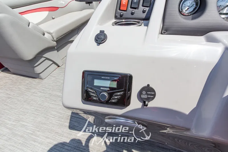 Slide: The Image of Control panel of a 2021 Bennington SV 22 Quad Bench boat with audio system. - 20