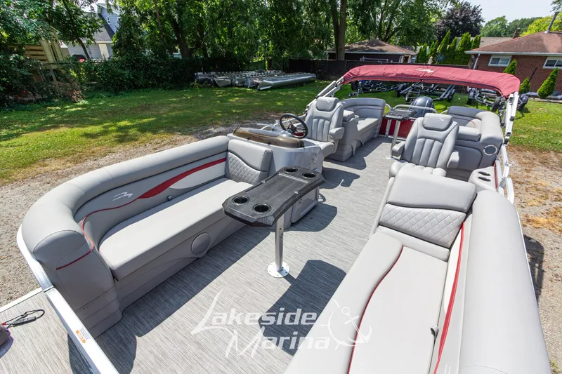 Slide: The Image of 2021 Bennington SV 22 Quad Bench pontoon boat with spacious seating and modern design. - 12