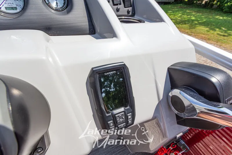 Slide: The Image of Dashboard of 2021 Bennington SV 22 Quad Bench with Garmin device and controls. - 21