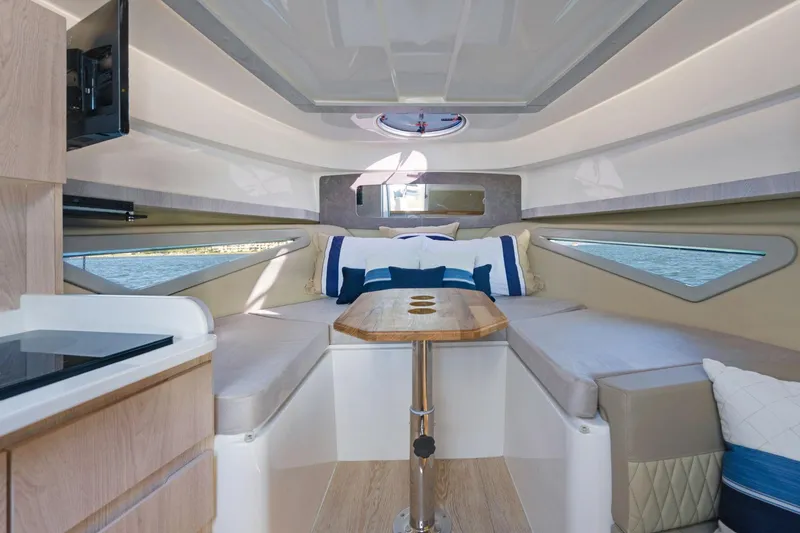 Slide: The Image of Luxurious interior of 2026 Hanover 375 yacht with cozy seating and elegant design. - 15