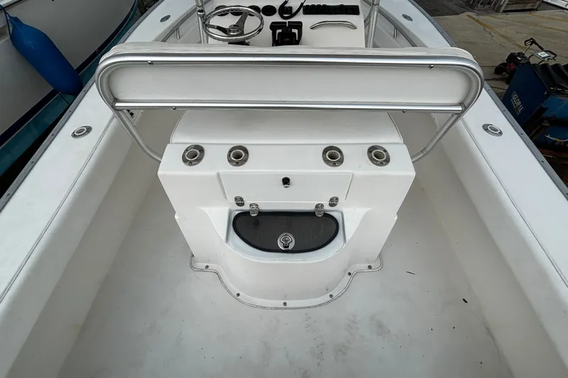 Slide: The Image of 2006 Cape Horn 24 boat interior with steering console and rod holders. - 12