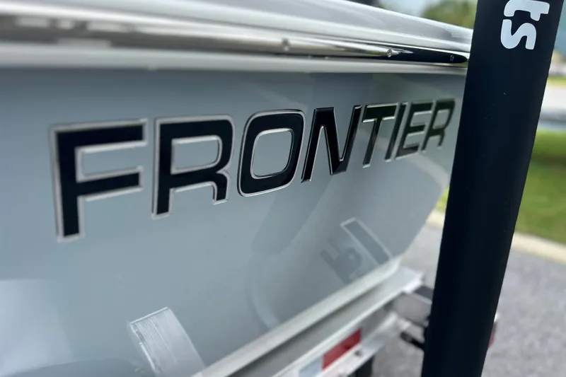 Slide: The Image of Close-up of 2027 Frontier 2104 boat logo on sleek exterior. - 21