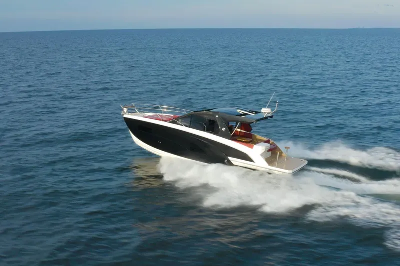 Slide: The Image of 2026 Hanover 387 yacht cruising on open sea, showcasing sleek design and performance. - 0