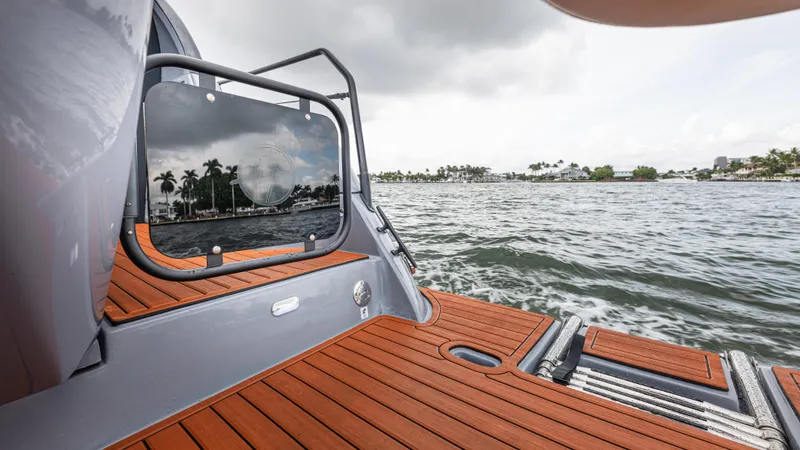 Slide: The Image of Hanover 415 Yacht, 2026, with teak deck on calm waters. - 31