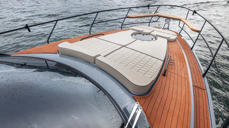 Slide: The Image of Luxurious deck of Hanover 415 boat, 2026 model, on calm waters. - 34