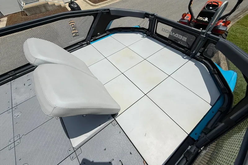 Slide: The Image of 2023 Sea-Doo Switch Sport 21 deck with seating, showcasing spacious and versatile design. - 7